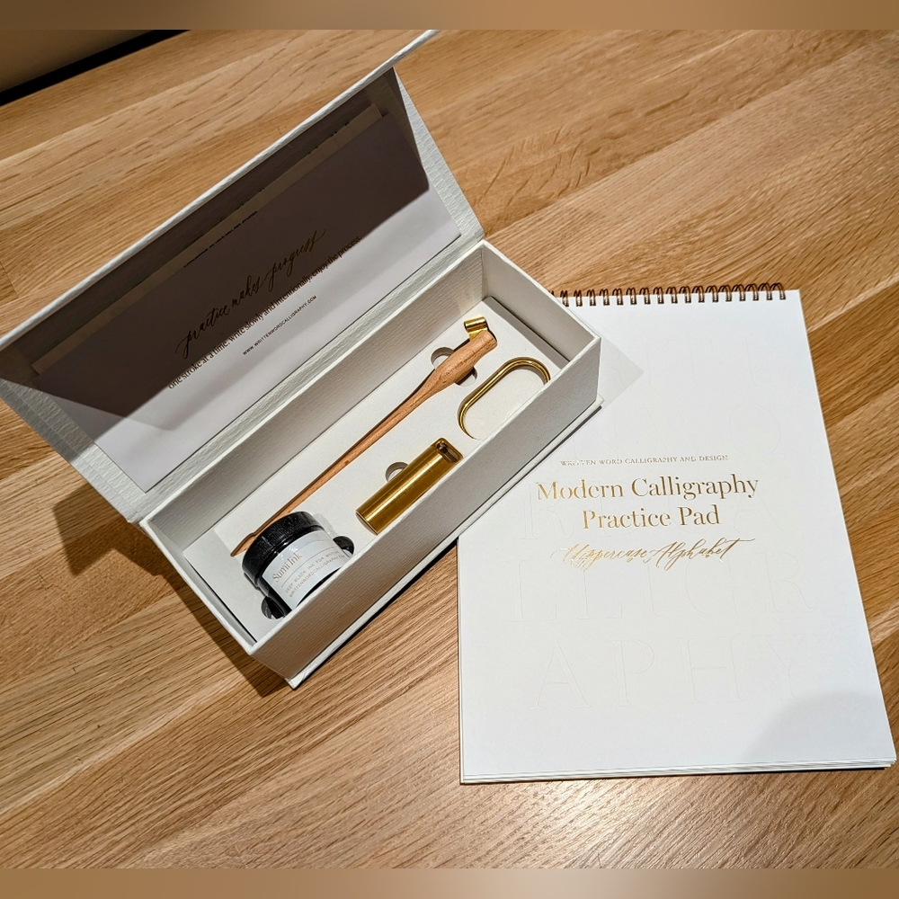 Written Word Beginner Calligraphy Kit plus Uppercase practice pad.